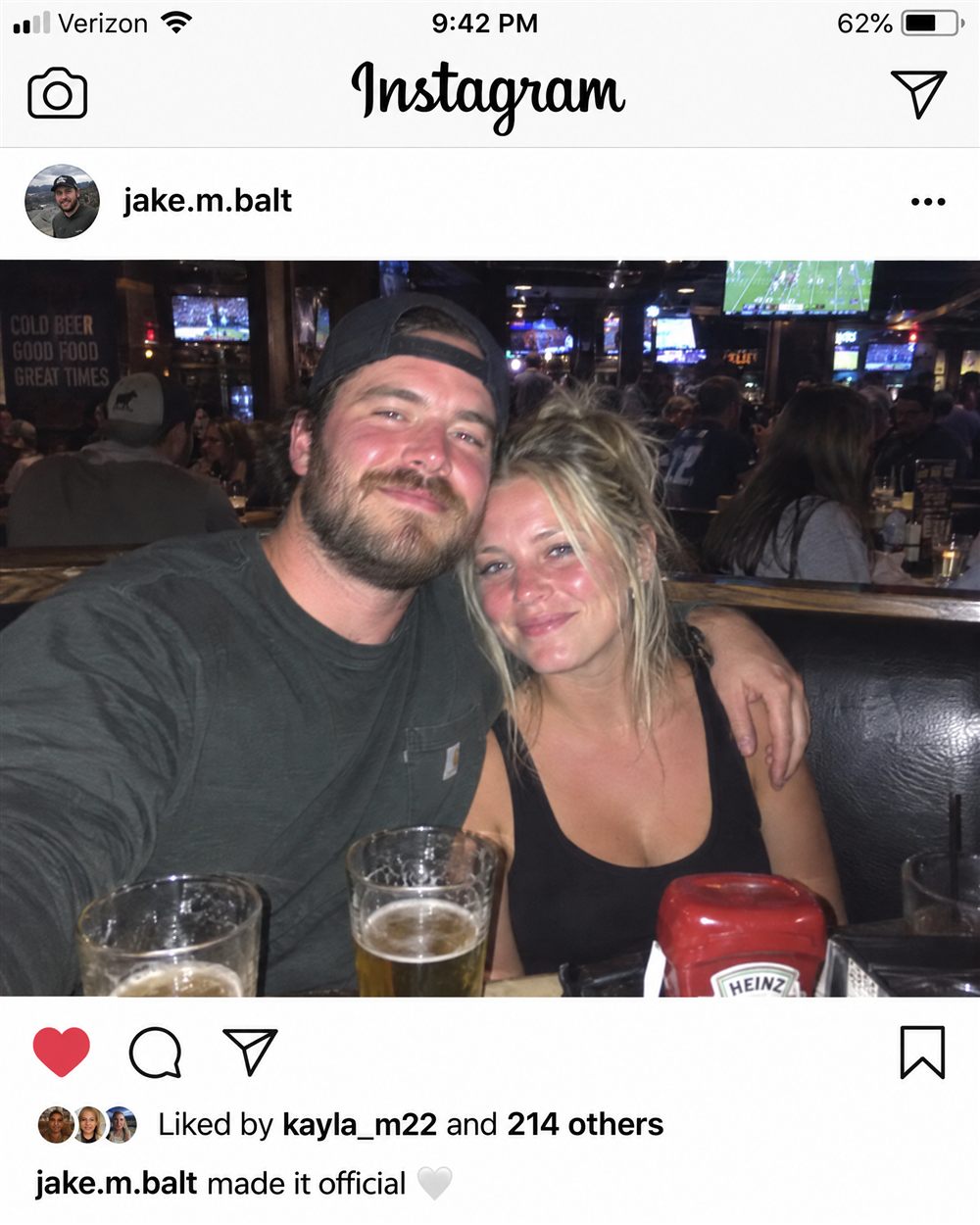 Instagram post of a couple smiling together in a bar